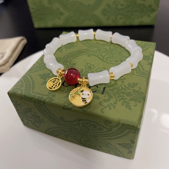 G*u*i bracelets